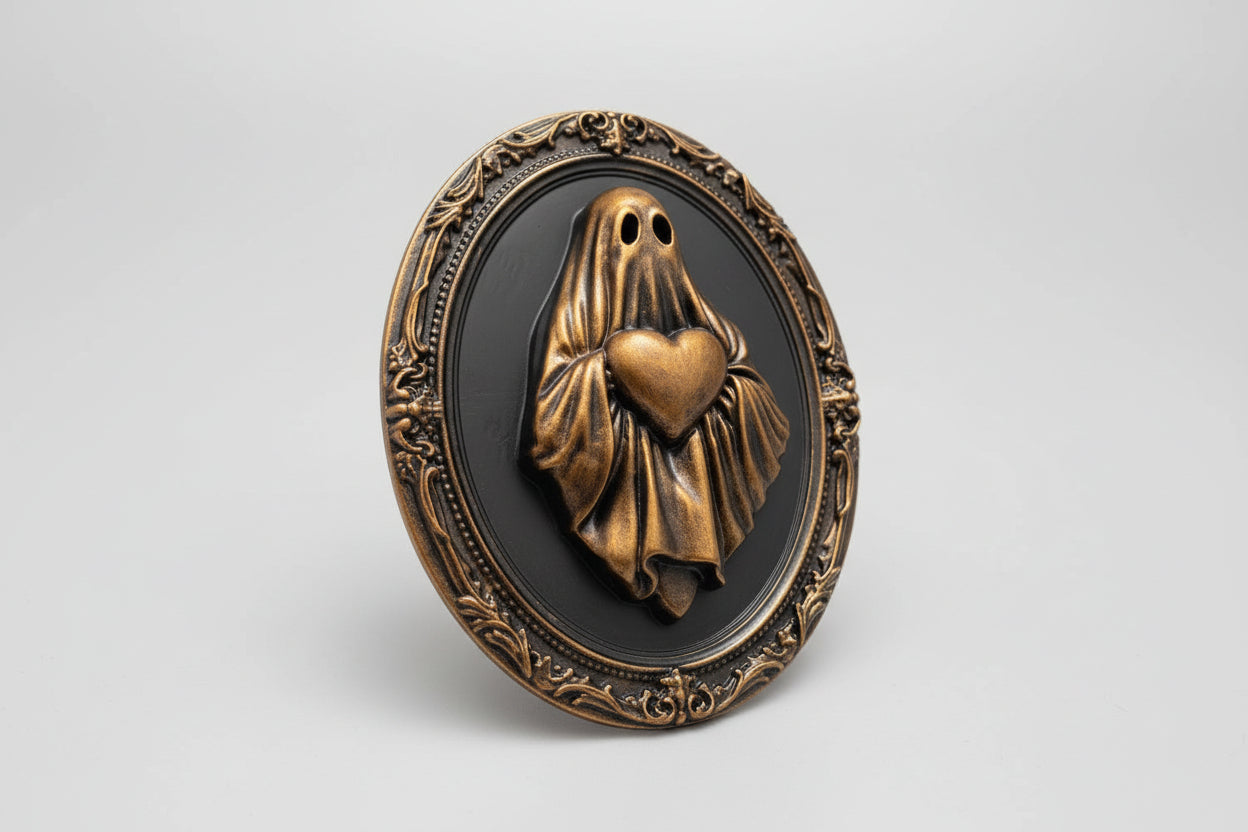 Gothic ghost frame with heart displayed on wall, dark academia home decor aesthetic