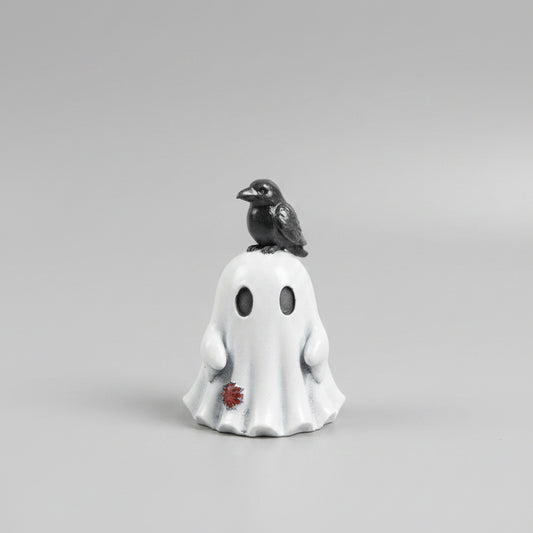 Corvin Moonwisp Ghost figurine with crow companion perched on its head.