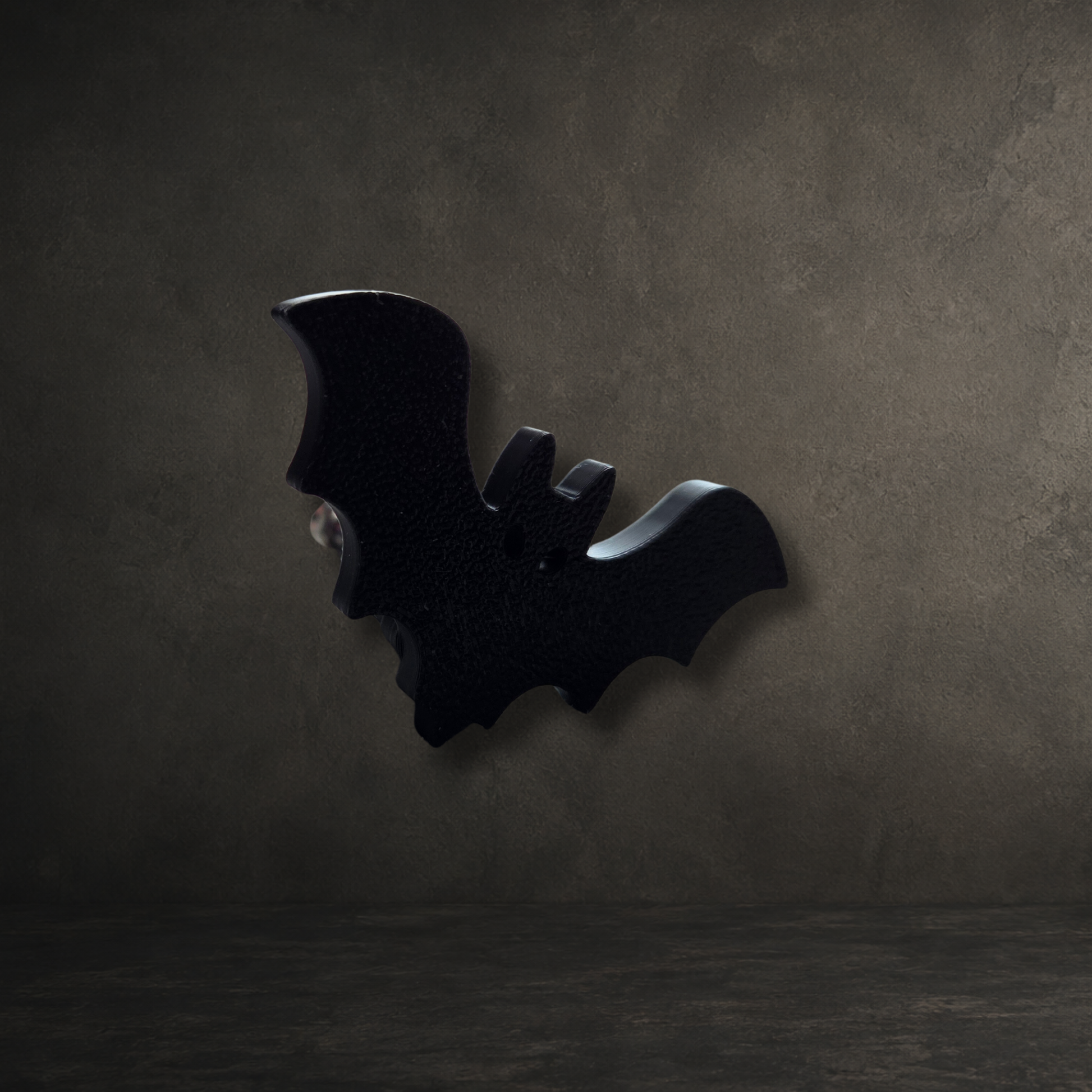 Decorative 3D printed bat cupboard handle with M4 fixing screw, ideal for gothic and Halloween-inspired home décor.