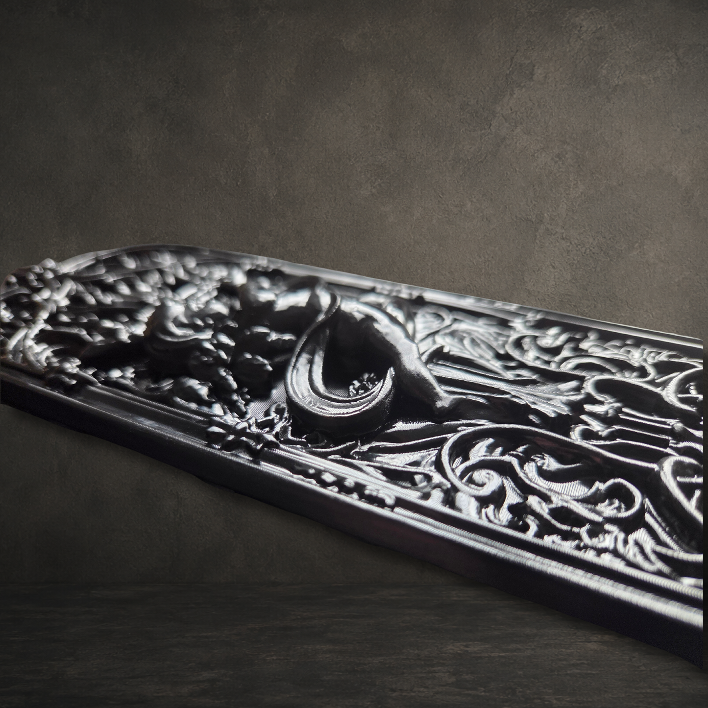 Close-up of the Cathedral Cherub decorative door push plate showing highly detailed Gothic scrollwork and cherub design.