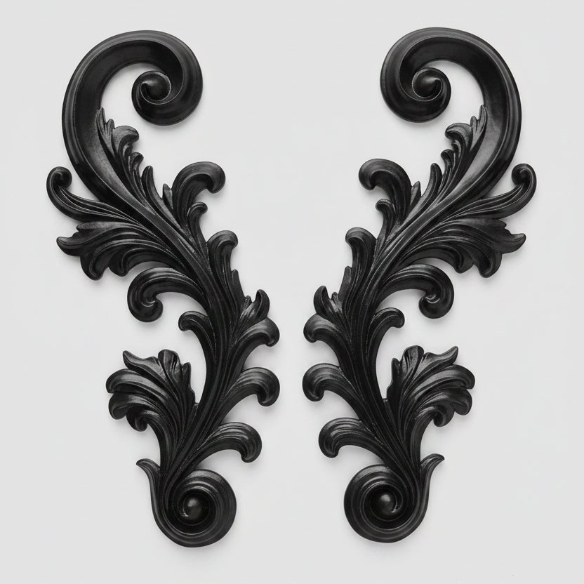 Black resin filigree wall decor featuring ornate baroque scrollwork with optional picture hooks for gothic and Victorian home interiors.
