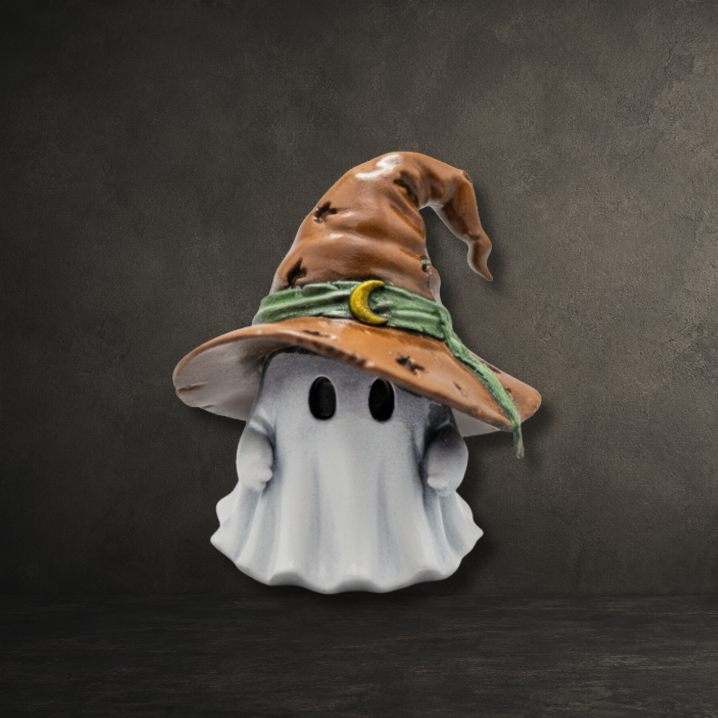 Bramblehat ghost figurine wearing a brown witch's hat from the Moonwisp Collection