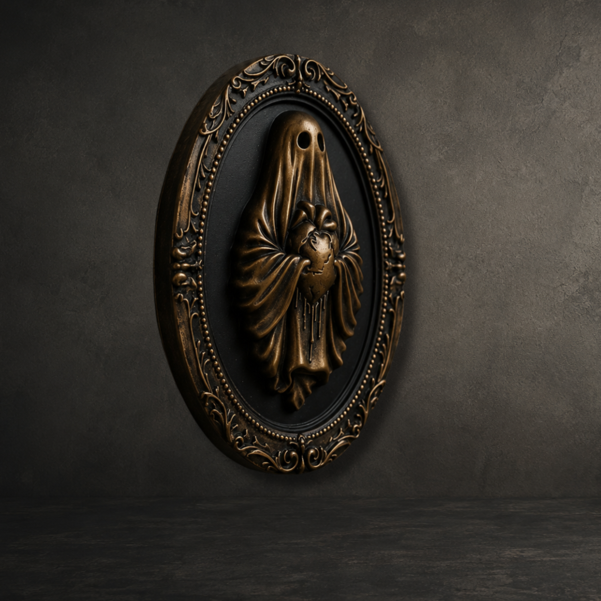 Bronze resin ghost cradling an anatomical heart mounted in an ornate 6-inch baroque wall frame inspired by Victorian gothic décor