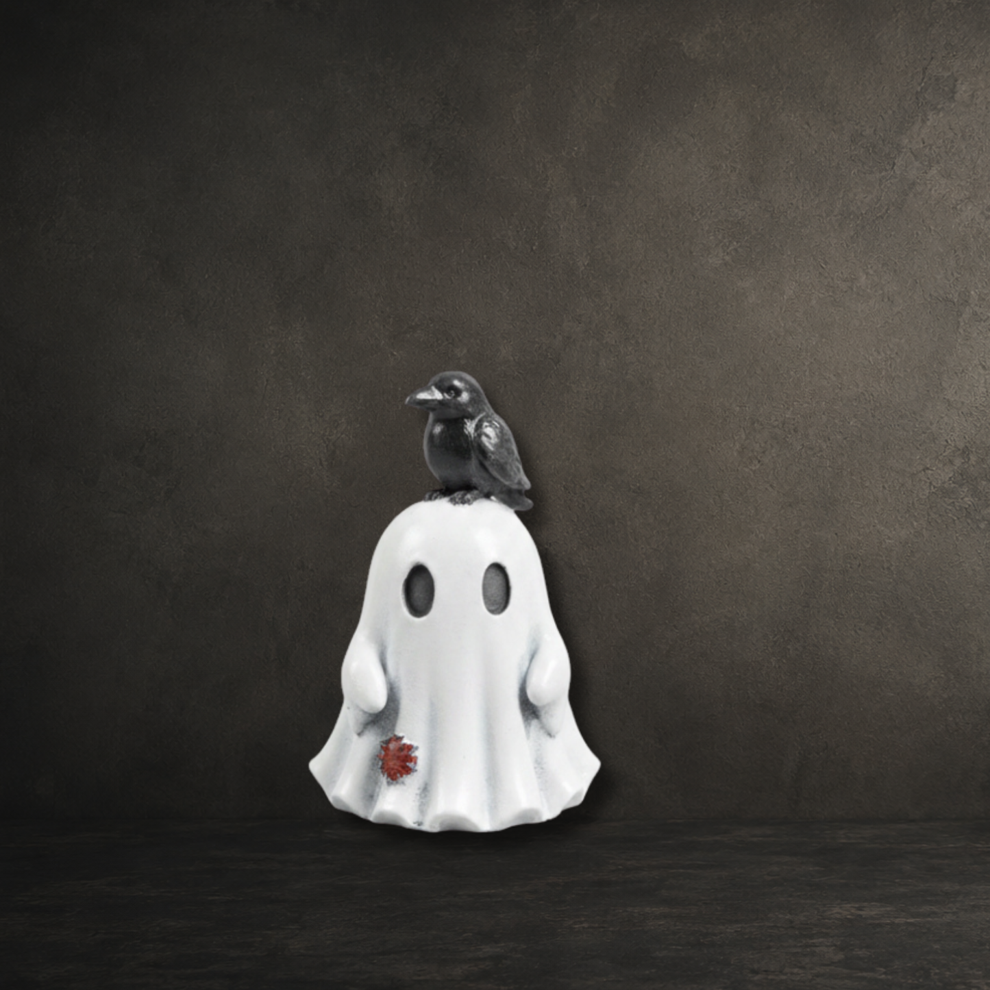 Corvin ghost figurine with a raven companion from the Moonwisp Collection