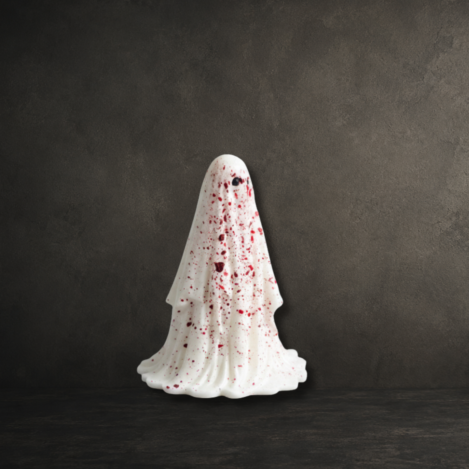 Hand-painted white resin ghost with crimson blood splatter detailing