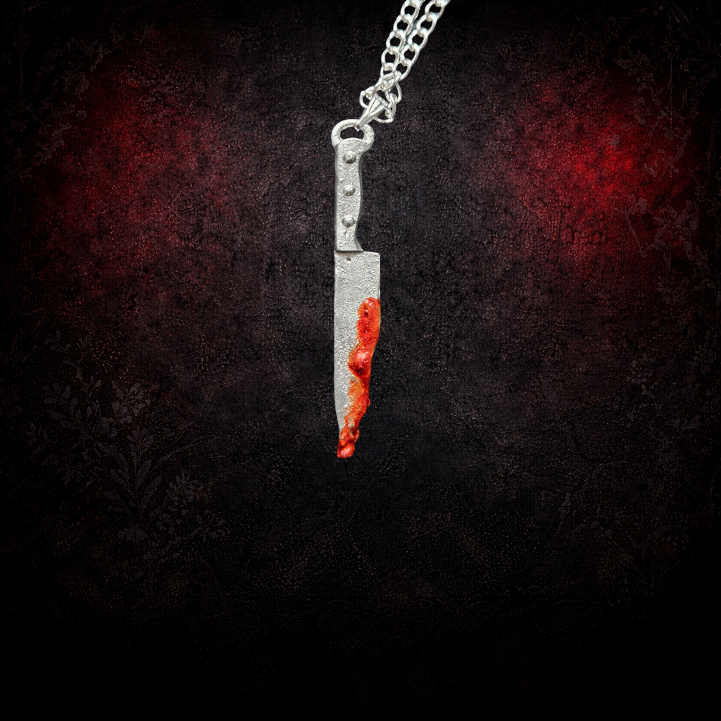 Dark knife pendant alternative jewellery