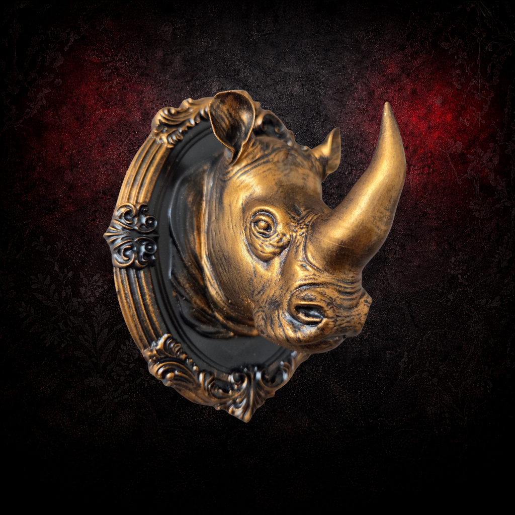 Dark rhino wall decor in ornate gothic frame