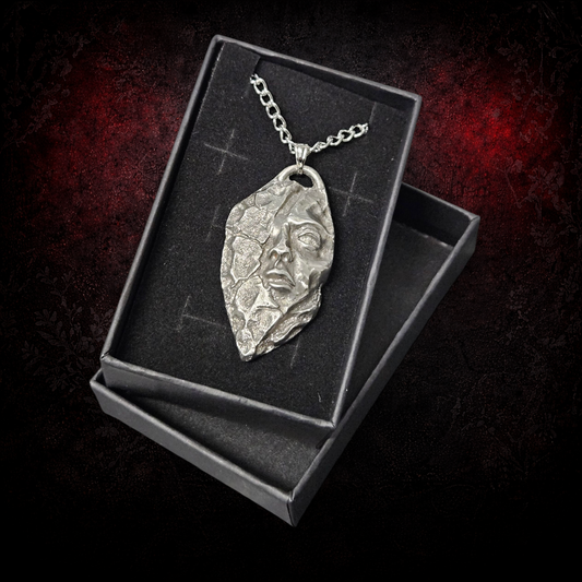 Emerging face pendant gothic jewellery