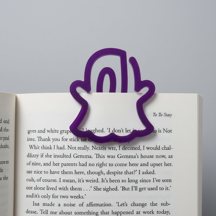 Purple acrylic ghost bookmark with a cute spooky silhouette design for gothic readers and Halloween book lovers.