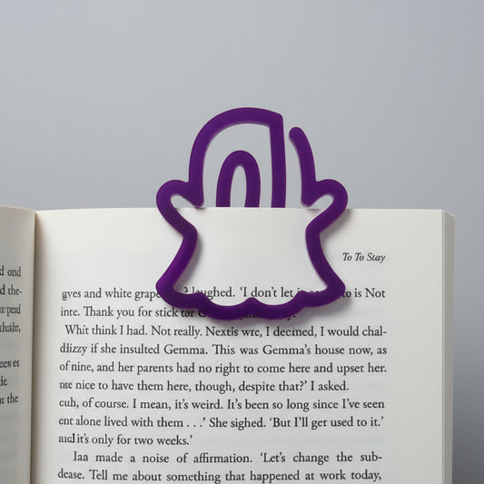 Purple acrylic ghost bookmark with a cute spooky silhouette design for gothic readers and Halloween book lovers.