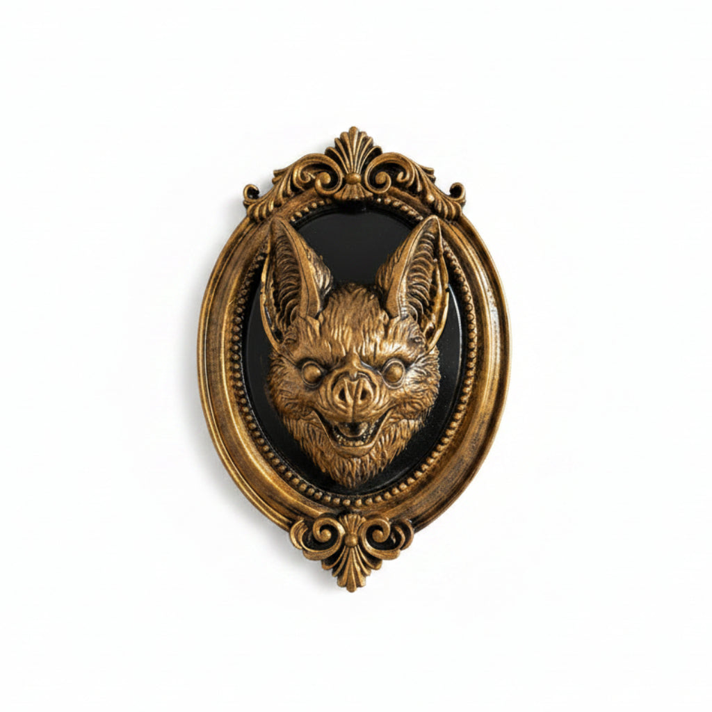 Bronze effect gothic bat resin frame with ornate oval border and black background