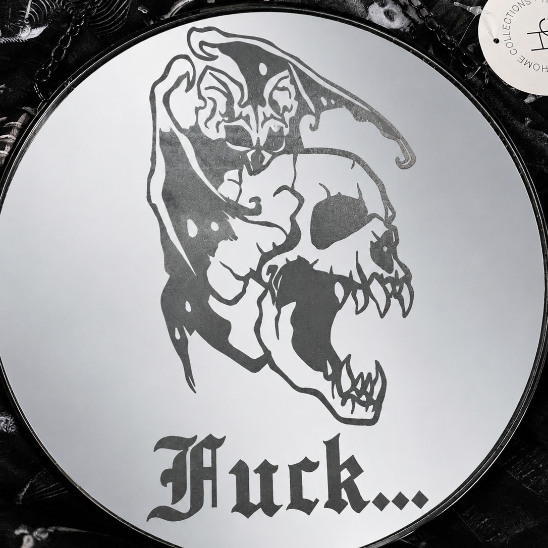 Gothic bat and skull wall mirror engraved with the word Fuck hanging on a black chain.