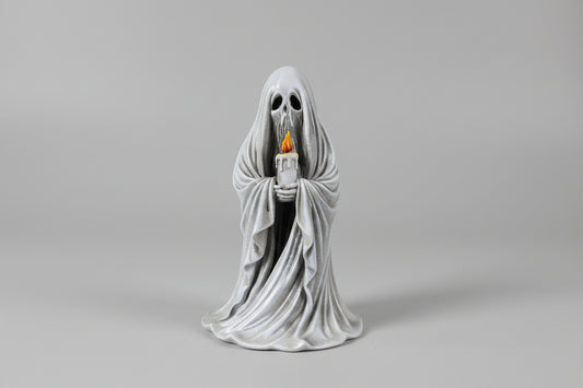 gothic ghost figurine holding a candle with detailed flowing drapery and hollow eyes