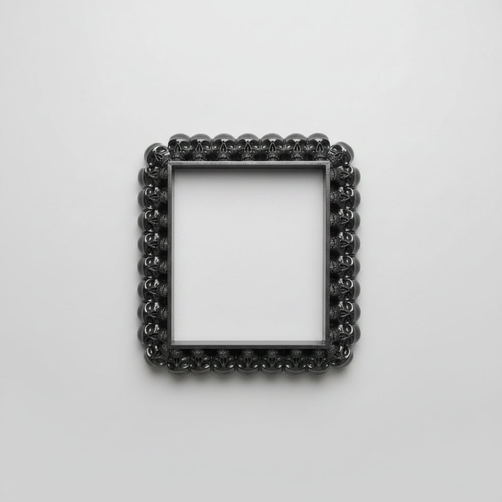 Close-up of resin cast gothic skull wall frame for UK light switches