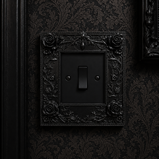 Gothic rose light switch surround, hand-cast in durable black resin to fit a standard UK single light switch, featuring ornate roses and intricate floral detailing for gothic, Victorian and dark home décor.