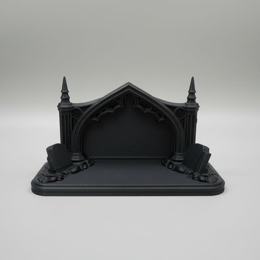 Gothic graveyard ghost display shelf holding four figurines with arched stone backdrop
