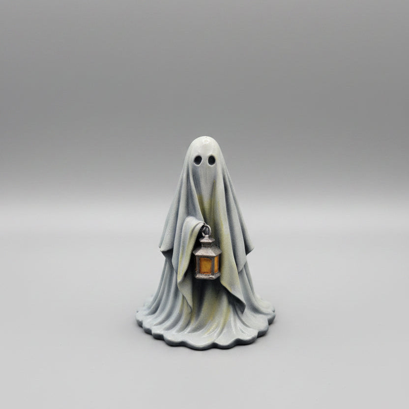 Rear view of Grimglow resin ghost figurine with flowing sheet detail