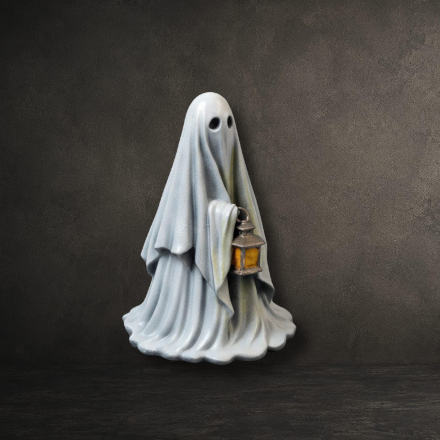 Grimglow, a hand painted resin ghost carrying a lantern, perfect for gothic home décor and ghost collections.