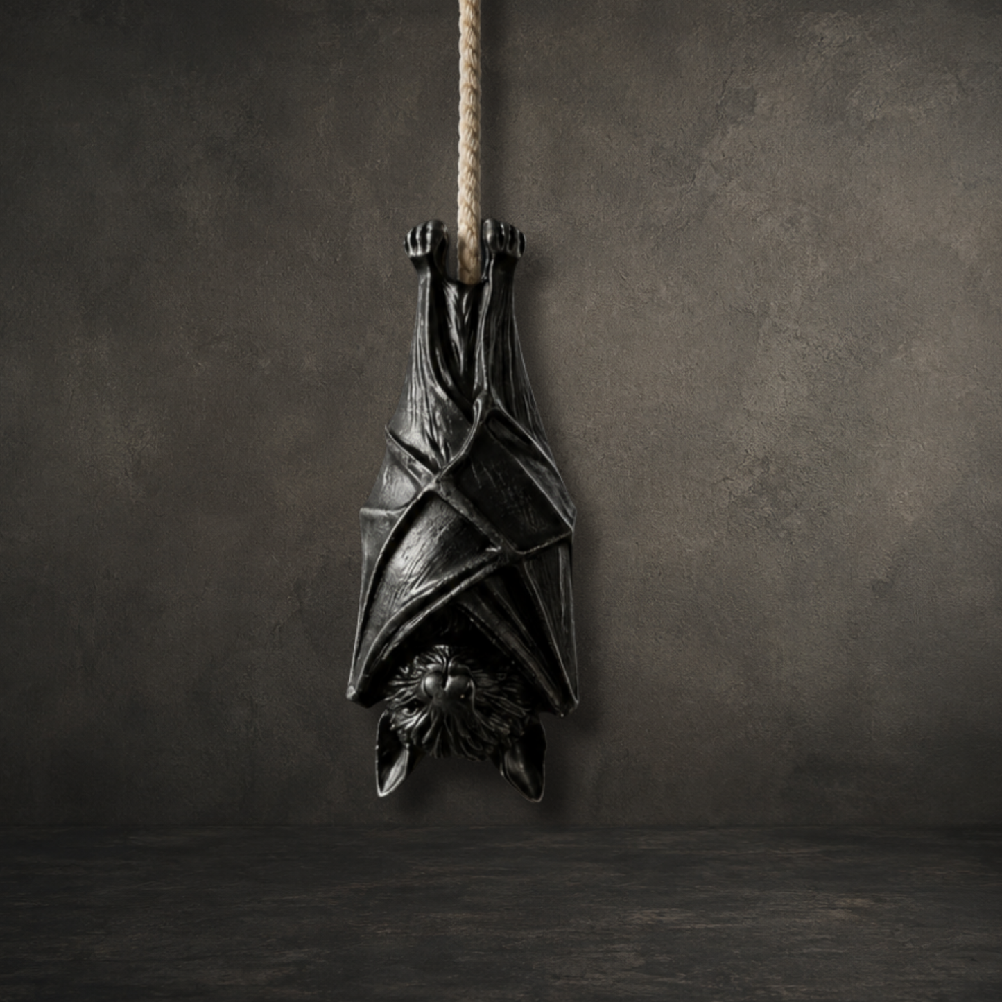 Hand painted resin bat light pull hanging from a ceiling cord, perfect for gothic bathrooms and alternative home décor.