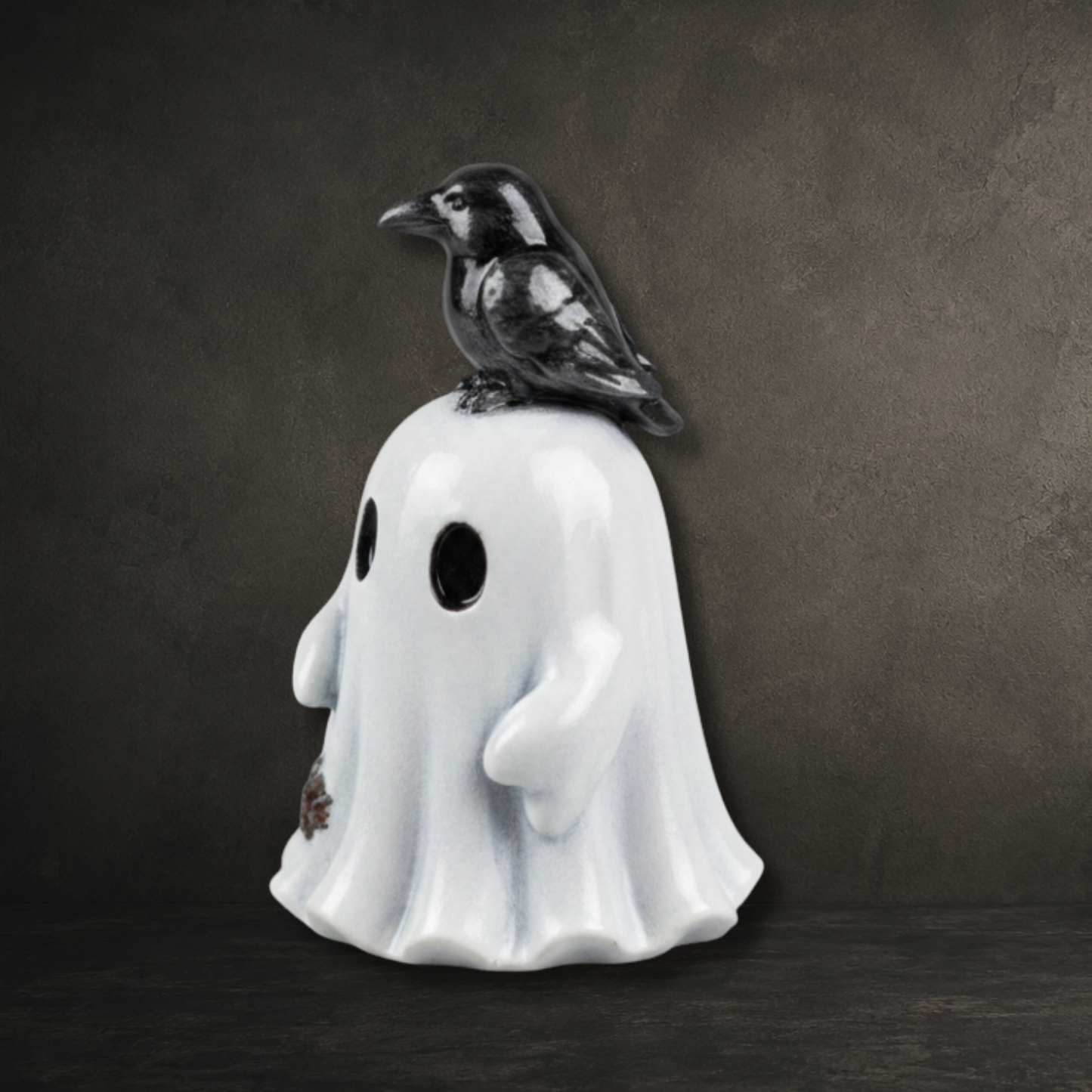 Small gothic ghost ornament featuring a detailed black raven