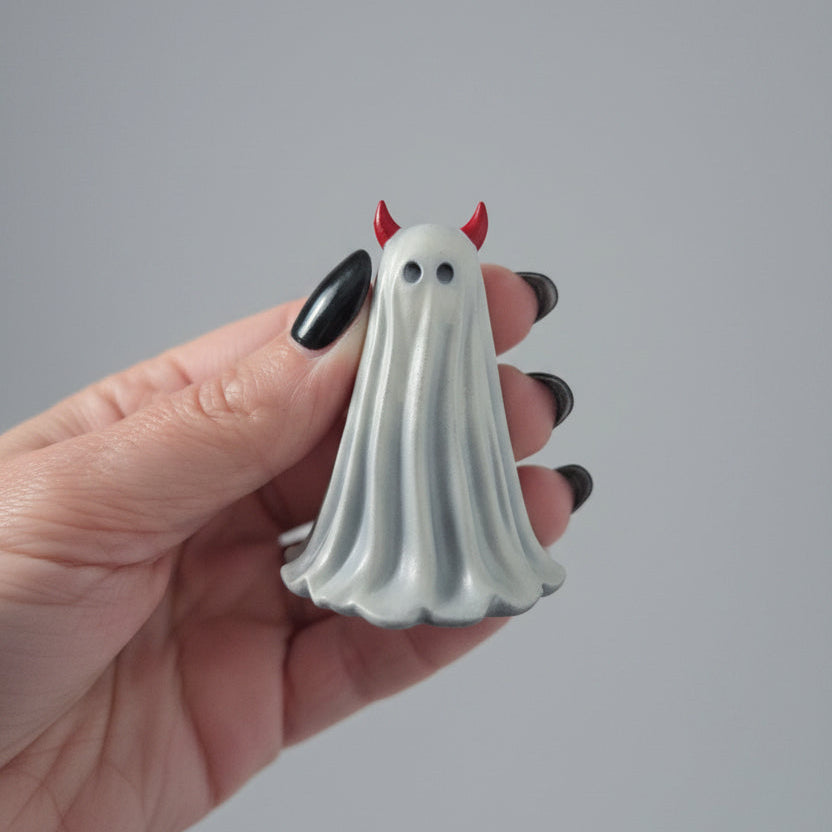 Cute spooky ghost ornament with red devil horns for gothic home decor