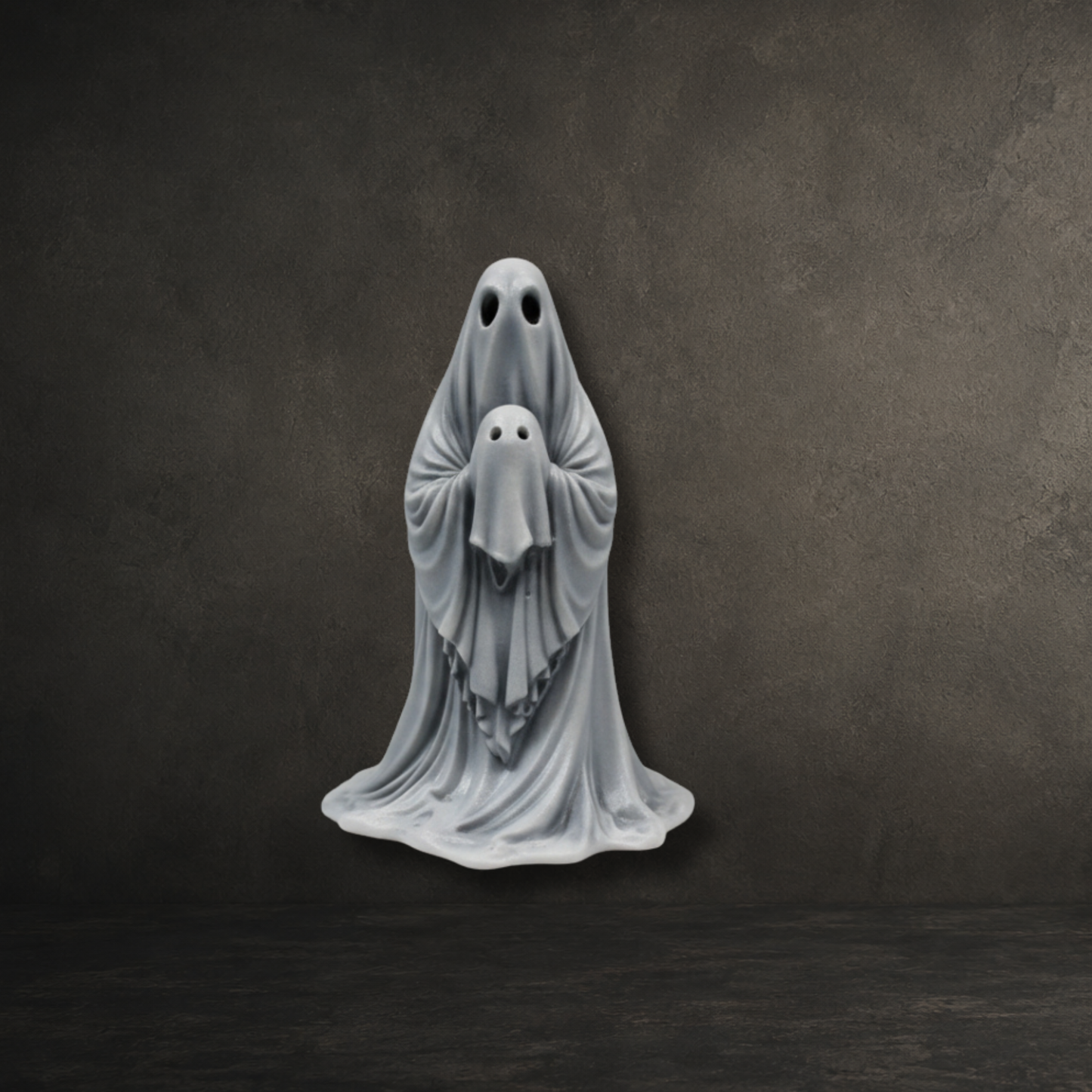 Original 6cm The Last Comfort ghost figurine holding a baby ghost from the Darkmoon Designs hand painted ghost collection.
