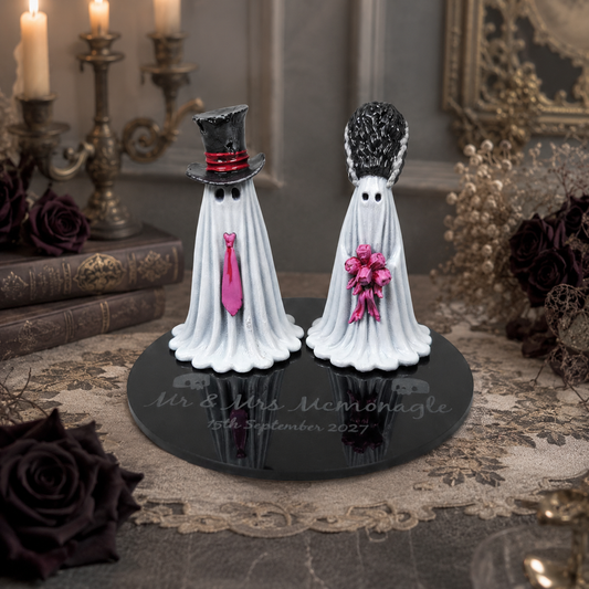 Personalised wedding ghost couple with engraved names and date on display base.
