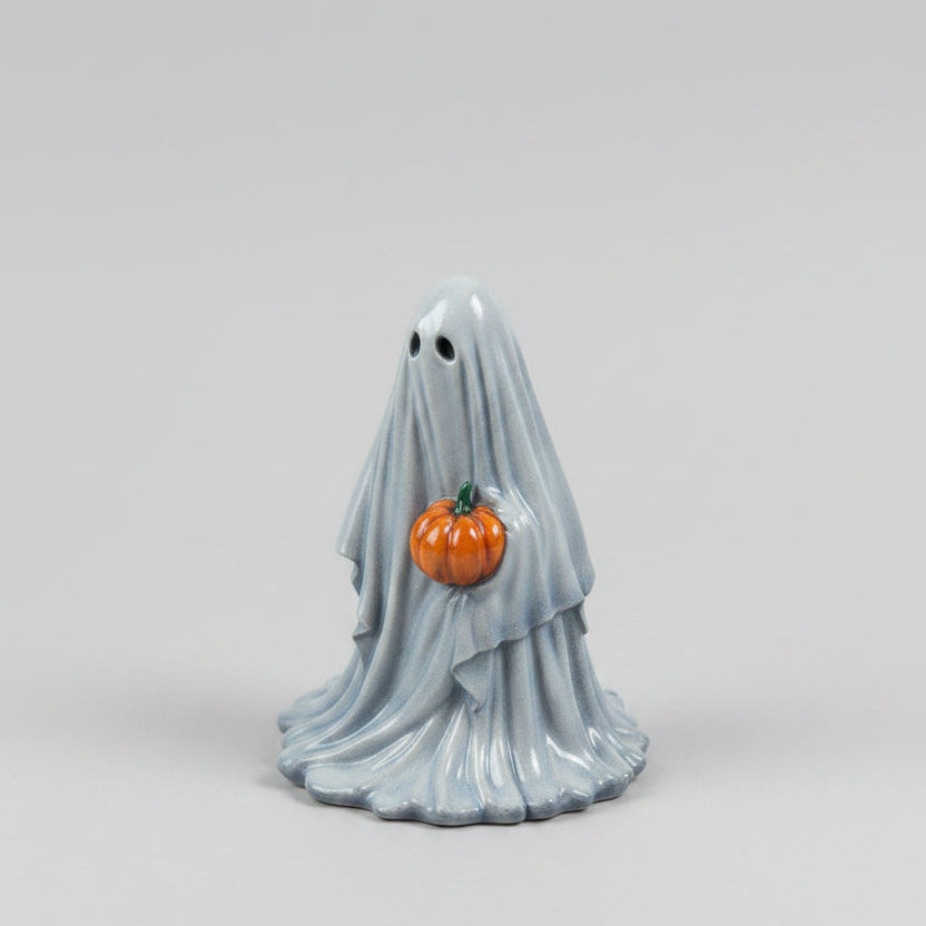 Side view of Pumpkinbearer resin ghost figurine with flowing sheet detail