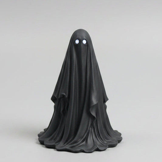 Silvergaze hand painted black ghost figurine with silver eyes front view