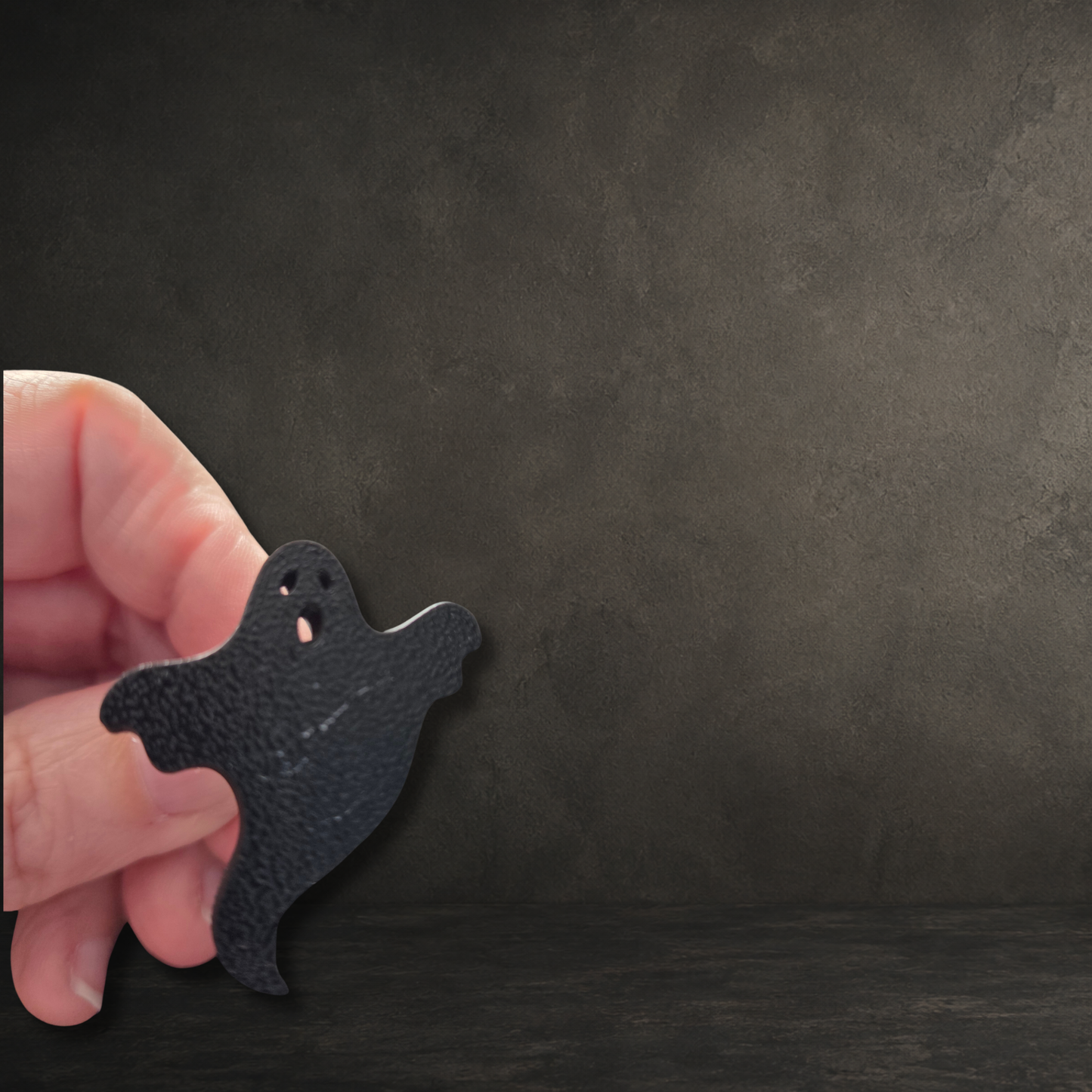 Small spooky ghost cabinet pull handle made from black PLA plastic with attached 4mm screw for drawers and cupboards.
