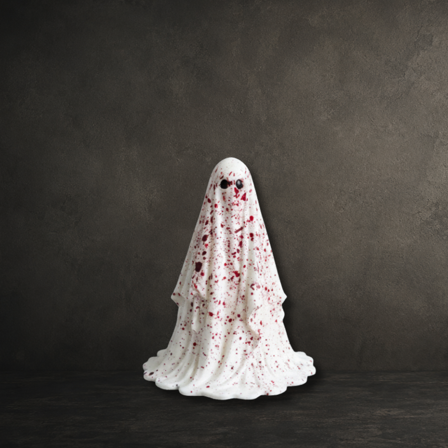 The Crimson Haunt blood spattered ghost figurine from The First Haunting collection