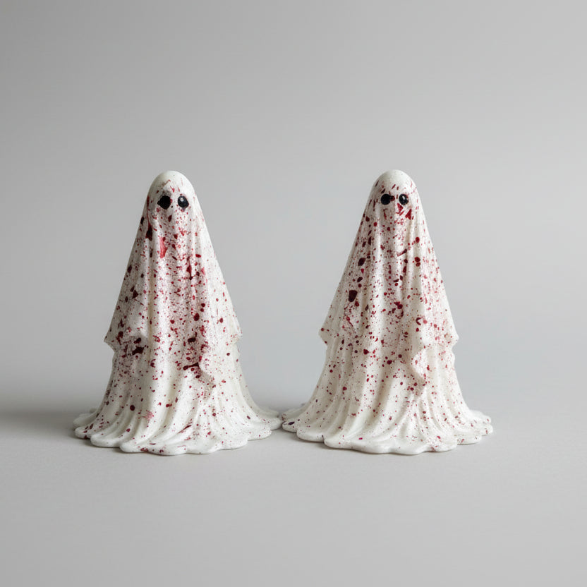 The Crimson Haunt gothic ghost figurine with crimson splatter detailing and black eyes