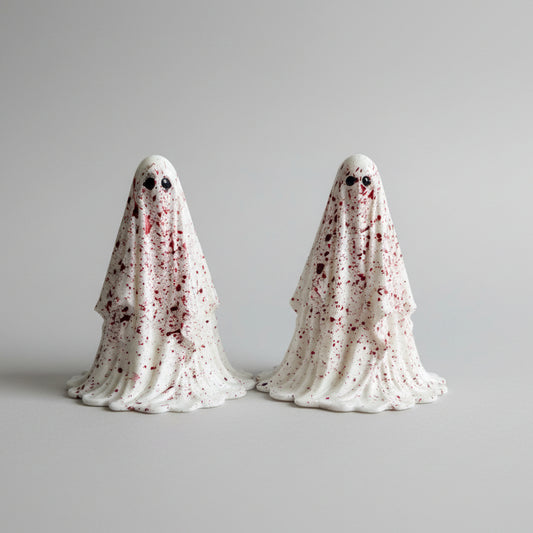 The Crimson Haunt gothic ghost figurine with crimson splatter detailing and black eyes