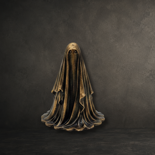 The Gilded Wraith gold ghost figurine from The First Haunting collection