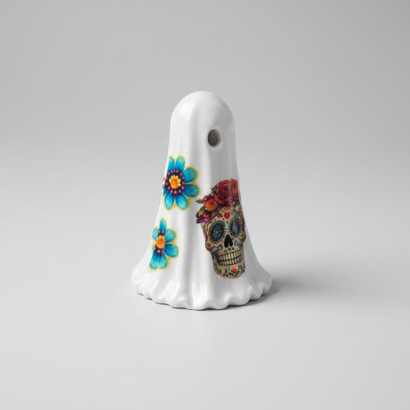Close-up detail of The Marigold Spirit ghost showing colourful sugar skull and rose artwork