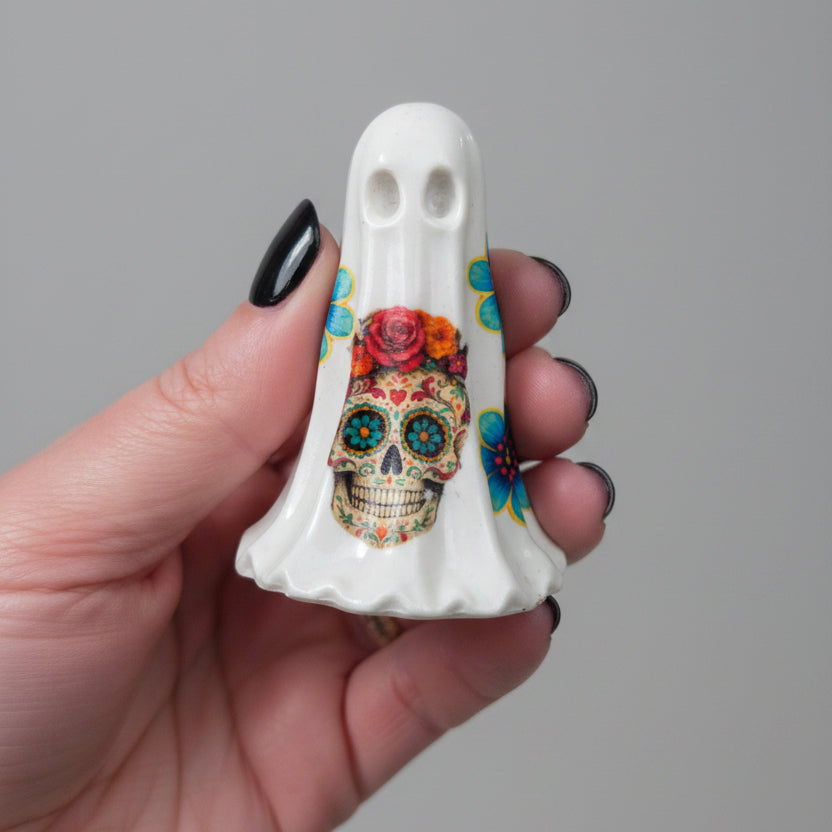 The Marigold Spirit Day of the Dead inspired ghost figurine displayed as gothic shelf decor