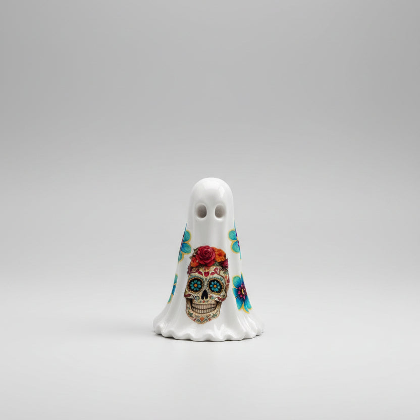 The Marigold Spirit ghost figurine featuring colourful sugar skull artwork on the front