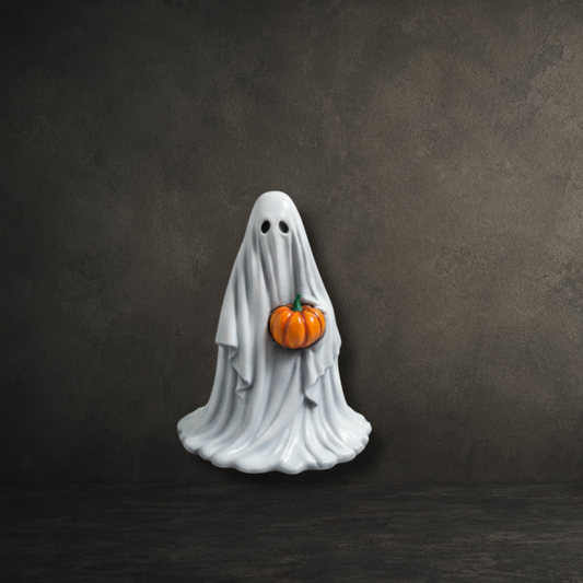 The Pumpkinbearer hand painted 6cm resin ghost holding a carved pumpkin by Darkmoon Designs.