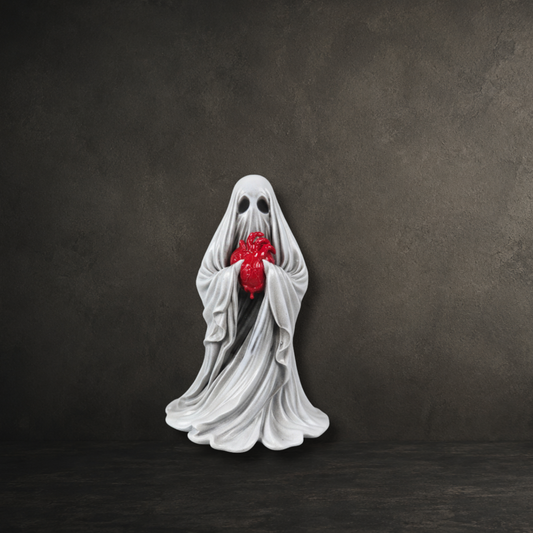 The Reliquary Ghost hand painted 6cm resin ghost holding an anatomical heart by Darkmoon Designs.