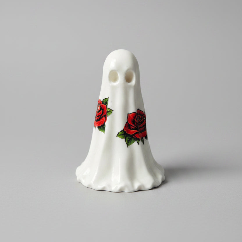 The Rosebound Haunt gothic resin ghost with red rose decals on white ghost figure