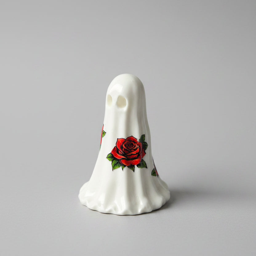 Side angle of The Rosebound Haunt miniature gothic ghost ornament with crimson roses