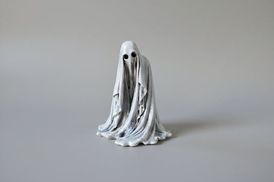 The Watcher gothic ghost figurine 6cm front view with hollow eyes and flowing draped form