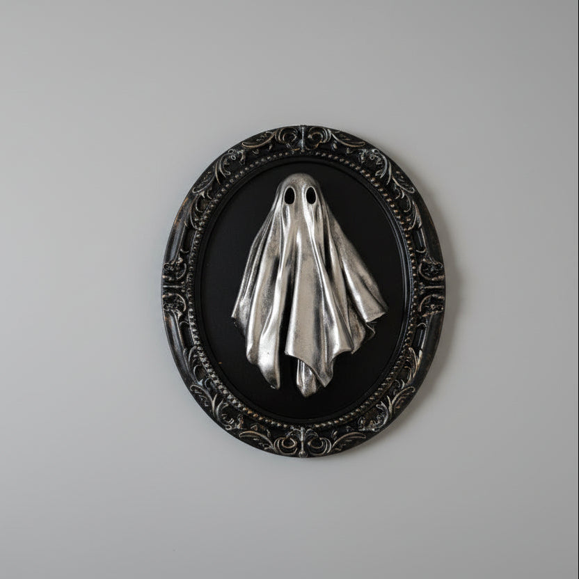 A silver version of ghost wall art