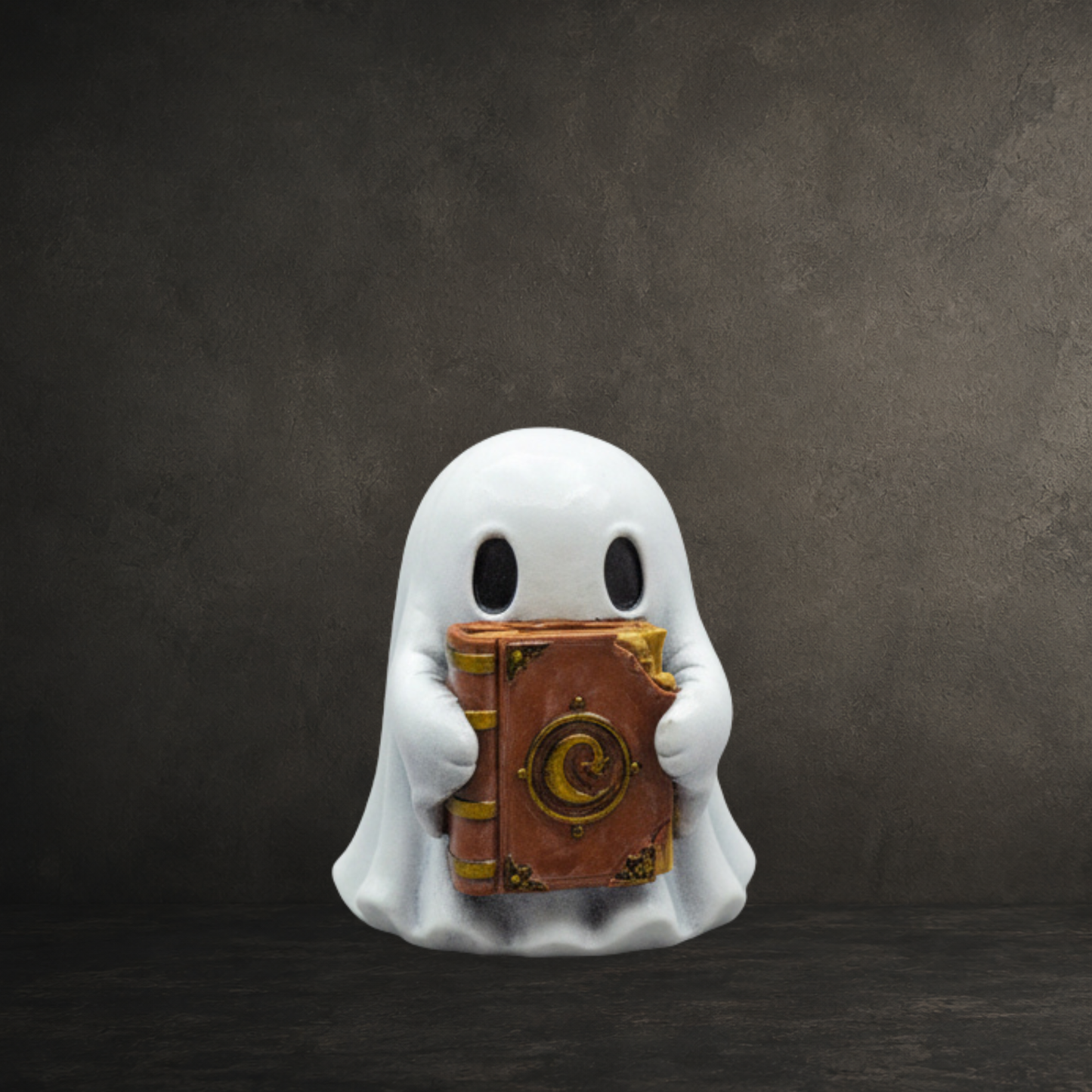 Tomes magical book ghost figurine from the Moonwisp Collection