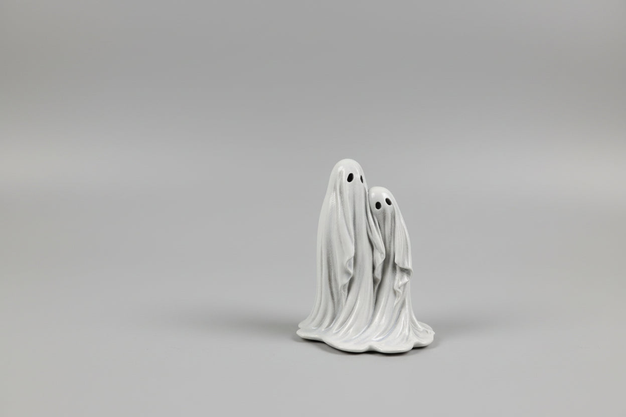 Side view of Twin Spirits miniature ghost figurine with flowing draped details