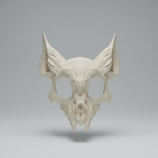 Unpainted undead cat skull mask with aged bone detailing, large ears, and dark fantasy styling by Darkmoon Designs.