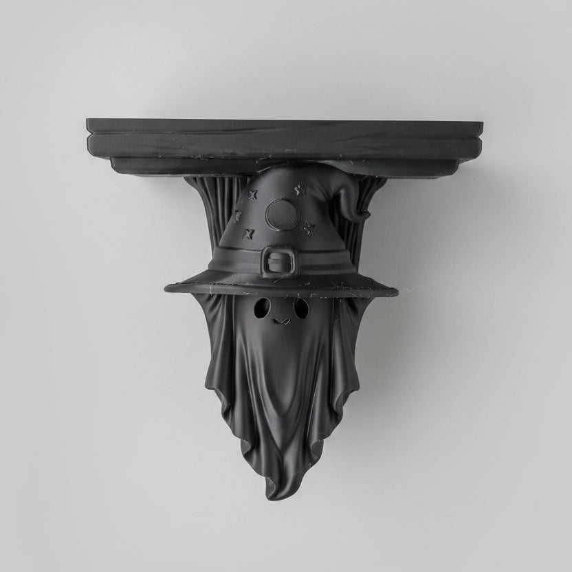 Dry brushed bronze wizard ghost shelf corbel displayed as gothic wall décor in a witchy home setting.